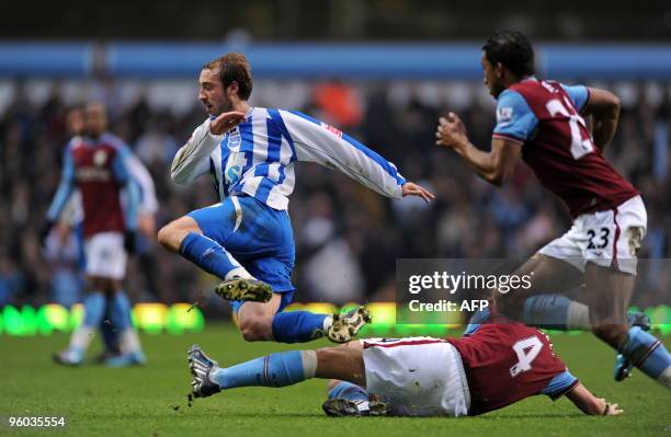 Brighton & Hove Albion's English striker Glenn Murray is tackled by Aston Villa's English midfielder Steve Sidwell during the FA Cup fourth round...