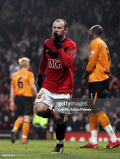 Wayne Rooney of Manchester United celebrates scoring his hat-trick during the Barclays Premier League match between Manchester United and Hull City...