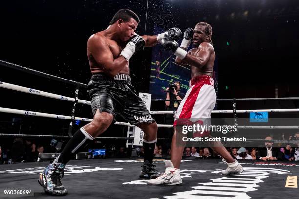 Juan De Angel and Immanuwel Aleem trade punches during the sixth round of the super middleweight fight at MGM National Harbor on May 19, 2018 in Oxon...