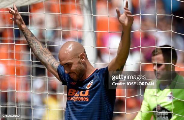 Valencia's Italian forward Simone Zaza celebrates a goal during the Spanish league football match between Valencia CF and RC Deportivo de la Coruna...