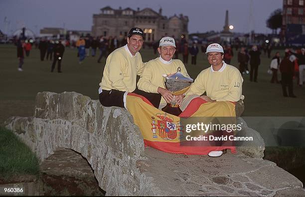 Spain players Jose Maria Olazabal, Miguel Jimenez, and Miguel Martin celebrate winning the Alfred Dunhill Cup 2000 held at the Old Course St Andrews,...