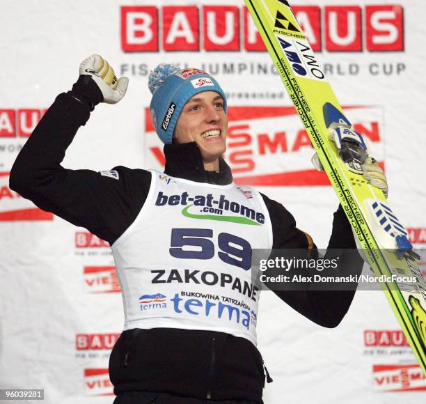 Gregor Schlierenzauer of Austria celebrates on the podium after winning the FIS Ski Jumping World Cup on January 23, 2010 in Zakopane, Poland.