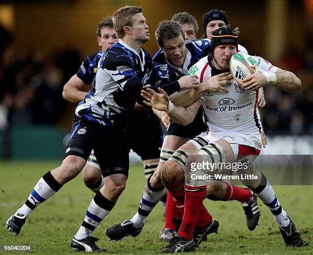 Stephen Ferris of Ulster is tackled during the Heineken Cup round six match between Bath Rugby and Uslter Rugby at the Recreation Ground on January...