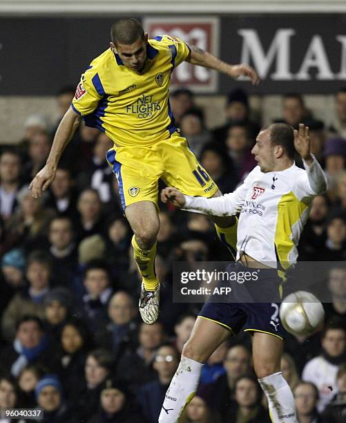 Leeds United's midfielder Bradley Johnson vies with Tottenham Hotspur's Scottish defender Alan Hutton during the FA Cup third round football match...