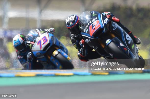 Kalex Sky Racing Team VR46 Italian rider Francesco Bagnaia competes in the lead ahead Kalex EG 0,0 Marc VDS Spanish rider Alex Marquez during the...