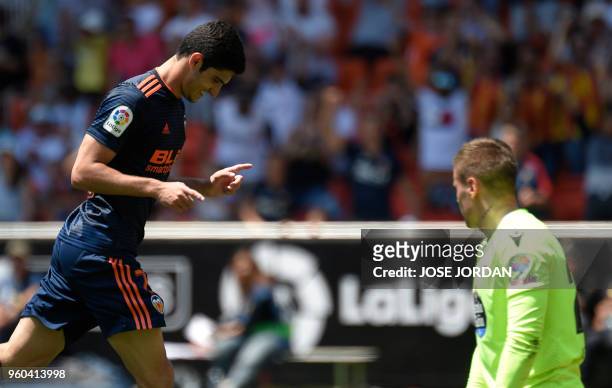 Valencia's Portuguese forward Goncalo Guedes celebrates a goal during the Spanish league football match between Valencia CF and RC Deportivo de la...