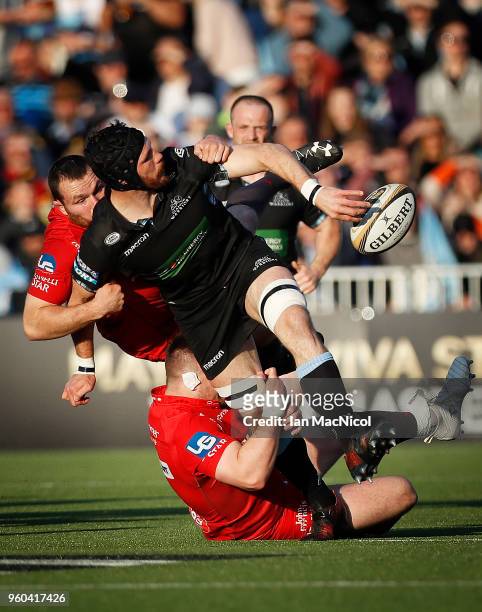 Tim Swinson of Glasgow Warriors is tackled by Rob Evans of Scarlets during the Guinness Pro14 Semi Final match between Glasgow Warriors and Scarlets...