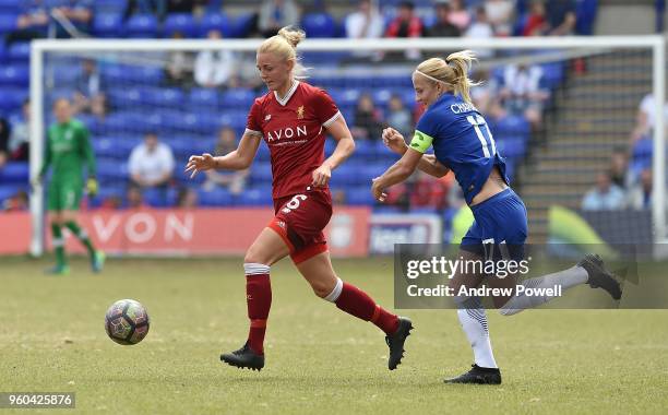 Sophie Ingle of Liverpool Ladies competes with Katie Chapman of Chelsea Ladies during the Women's Super League match between Liverpool Ladies and...