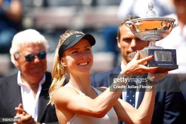 Elina Svitolina of Ukraine celebrates victory with the trophy after the Women's Singles final match between Simona Halep and Elina Svitolina on Day...