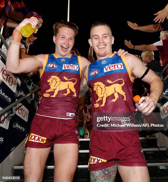 Alex Witherden and Dayne Beams of the Lions celebrate during the 2018 AFL round nine match between the Brisbane Lions and the Hawthorn Hawks at the...