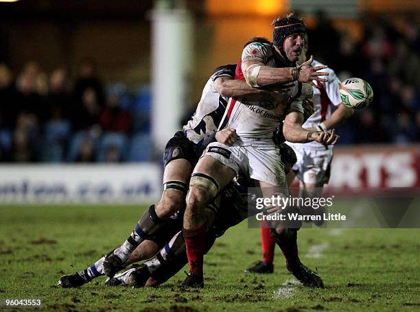 Stephen Ferris of Ulster is tackled during the Heineken Cup round six match between Bath Rugby and Uslter Rugby at the Recreation Ground on January...