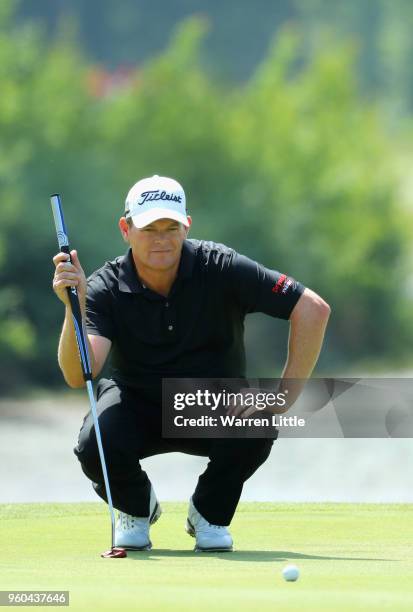 David Drysdale of Scotland lines up his putt on the 4th green during his Semi Final match against Adrian Otaegui of Spain during the final day of the...