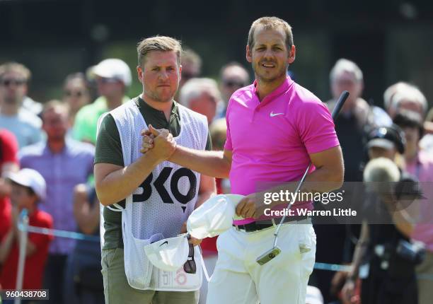 James Heath of England shakes hands with his caddy after he is defeated during his semi final match against Benjamin Herbert of France during the...