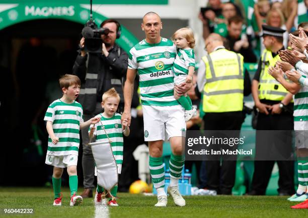 Scott Brown of Celtic is seen with his children during the Scott Brown testimonial match between Celtic and Republic of Ireland XI at Celtic Park on...