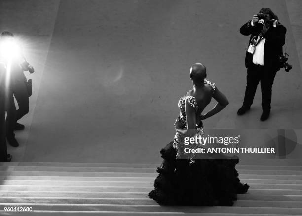 Tanzanian model Miriam Odemba arrives on May 17, 2018 for the screening of the film "Capharnaum" at the 71st edition of the Cannes Film Festival in...