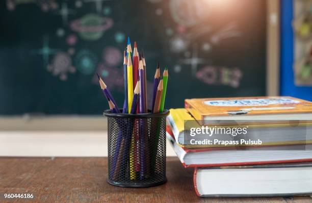 school books on desk, education concept - text book stockfoto's en -beelden