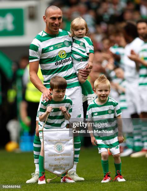 Scott Brown of Celtic is seen with his children during the Scott Brown testimonial match between Celtic and Republic of Ireland XI at Celtic Park on...