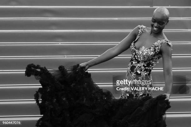 Tanzanian model Miriam Odemba arrives on May 17, 2018 for the screening of the film "Capharnaum" at the 71st edition of the Cannes Film Festival in...