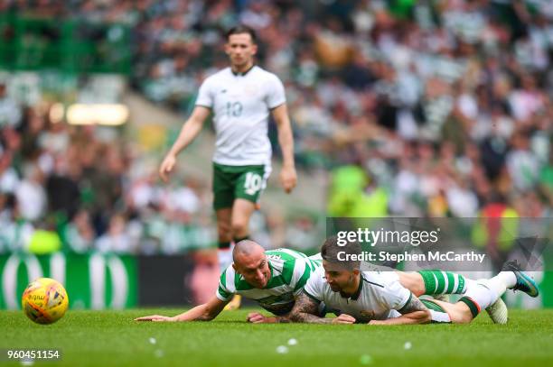 Glasgow , United Kingdom - 20 May 2018; Sean Maguire of Republic of Ireland XI in action against Scott Brown of Celtic during Scott Brown's...