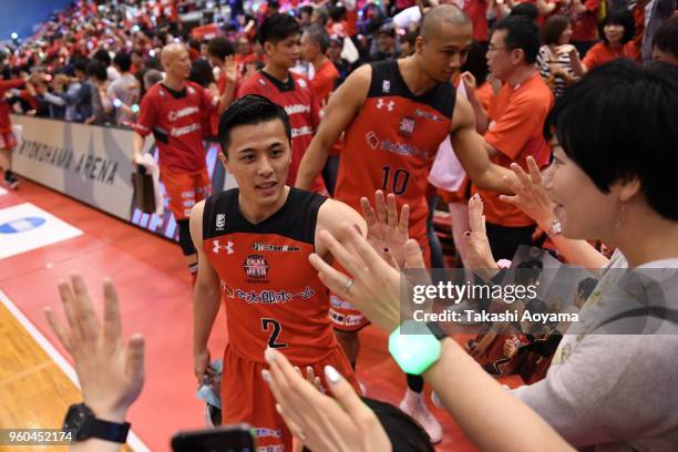 Yuki Togashi of the Chiba Jets high fives with fans after the B.League Championship semi final game 2 between Chiba Jets and Ryukyu Golden Kings at...