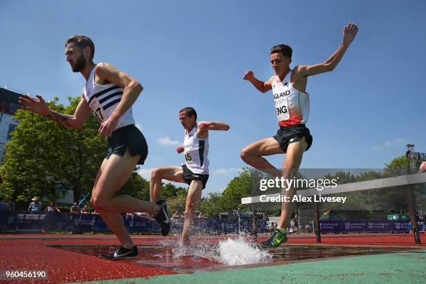 Daniel Jarvis of England clears the water jump during the Men's 3000m Steeple Chase at the Loughborough International Athletics event on May 20, 2018...