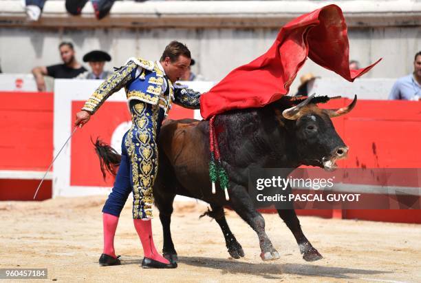 French matador Juan Bautista performs a muleta pass on a Juan Pedro Domecq fighting bull during the Pentecost Feria corridas on May 20, 2018 at the...