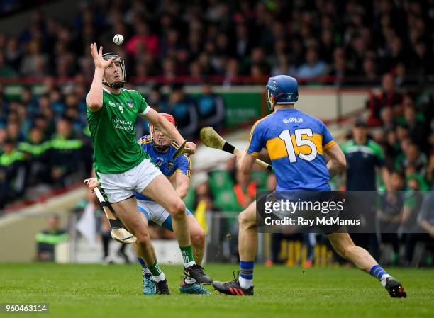 Limerick , Ireland - 20 May 2018; Diarmaid Byrnes of Limerick in action against Willie Connors and John McGrath, right, of Tipperary during the...