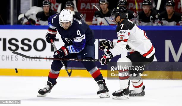 Will Butcher of the United States and Jordan Eberle of Canada battle for the puck during the 2018 IIHF Ice Hockey World Championship Bronze Medal...