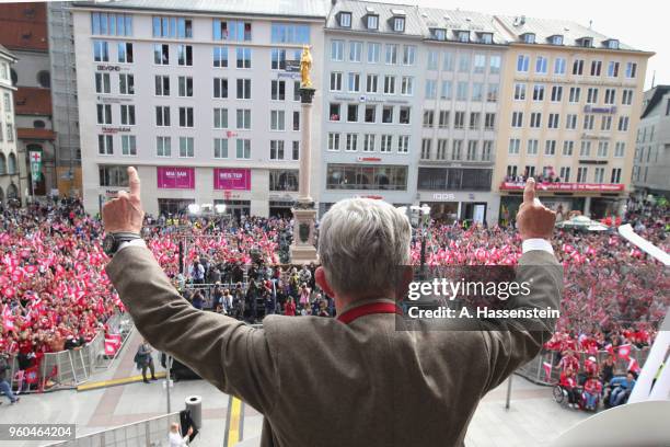 Jupp Heynckes, head coach of Bayern Muenchen celebrates winning the German Championship title on the town hall balcony at Marienplatz on May 20, 2018...