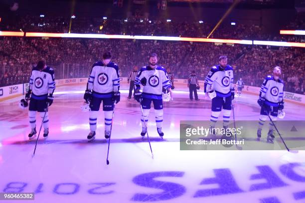 Mark Scheifele, Jacob Trouba, Josh Morrissey, Blake Wheeler and Kyle Connor of the Winnipeg Jets stand during the national anthem before Game Three...