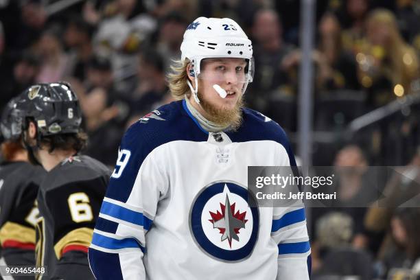 Patrik Laine of the Winnipeg Jets skates to the bench in Game Three of the Western Conference Final against the Vegas Golden Knights during the 2018...