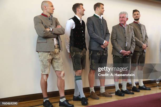 Arjen Robben, Thomas Mueller, Manuel Neuer, head coach Jupp Heynckes and Sven Ulreich of Bayern Muenchen celebrate winning the German Championship...