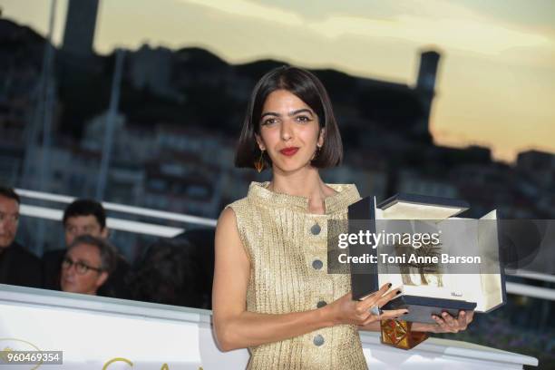 Actress and daughter of Jafar Panahi Solmaz Panahi poses while accepting the Best Screenplay award for '3 Faces ' at the photocall the Palme D'Or...