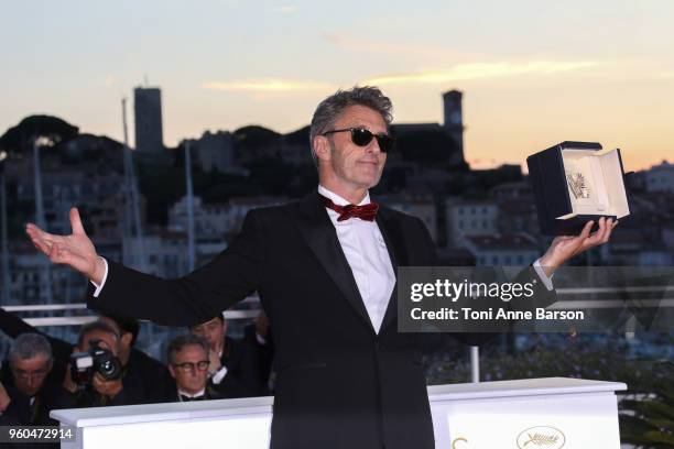 Director Pawel Pawlikowski poses with the Best Director award for 'Cold War' at the photocall the Palme D'Or Winner during the the 71st annual Cannes...