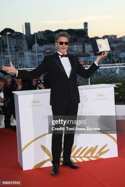 Director Pawel Pawlikowski poses with the Best Director award for 'Cold War' at the photocall the Palme D'Or Winner during the the 71st annual Cannes...