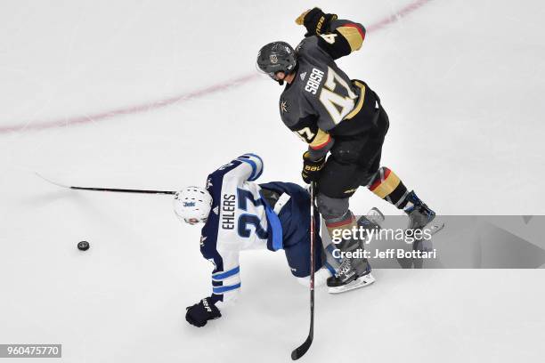 Luca Sbisa of the Vegas Golden Knights collides with Nikolaj Ehlers of the Winnipeg Jets in Game Four of the Western Conference Final during the 2018...