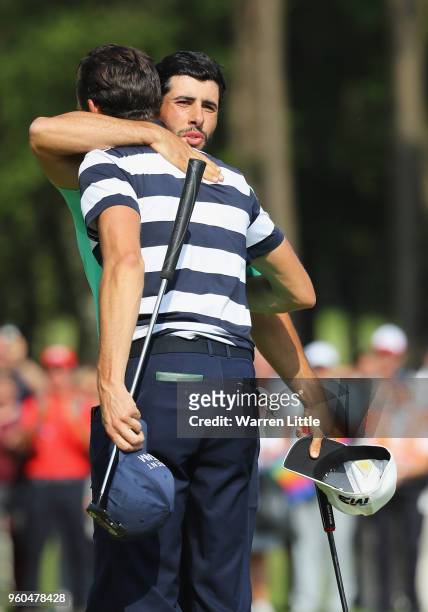 Adrian Otaegui of Spain is congratulated by Benjamin Hebert after he wins the tournament on the final day of the Belgian Knockout at Rinkven...