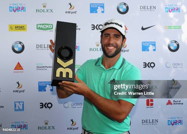 Adrian Otaegui of Spain poses with the trophy after beating Benjamin Hebert during their final match to win the tournament on the final day of the...