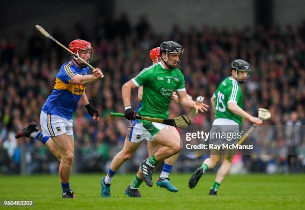 Limerick , Ireland - 20 May 2018; Darragh ODonovan of Limerick in action against Billy McCarthy of Tipperary during the Munster GAA Hurling Senior...