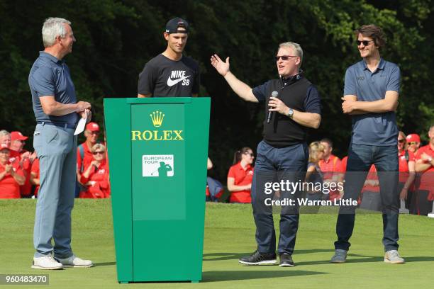 Keith Pelley, Chief Executive of the European Tour delivers a speech as Thomas Pieters looks on during the final day of the Belgian Knockout at...