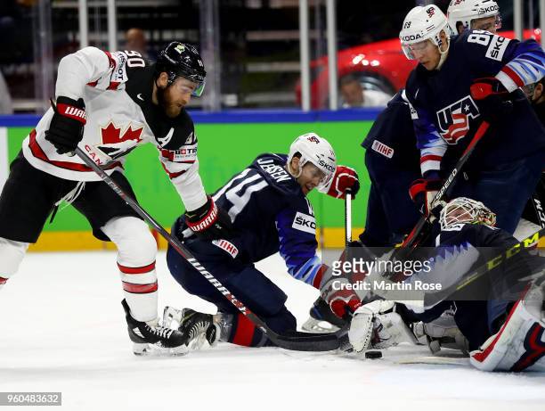 Keith Kinkaid, goaltender of the United States tends net against Ryan O'Reilly of Canada during the 2018 IIHF Ice Hockey World Championship Bronze...