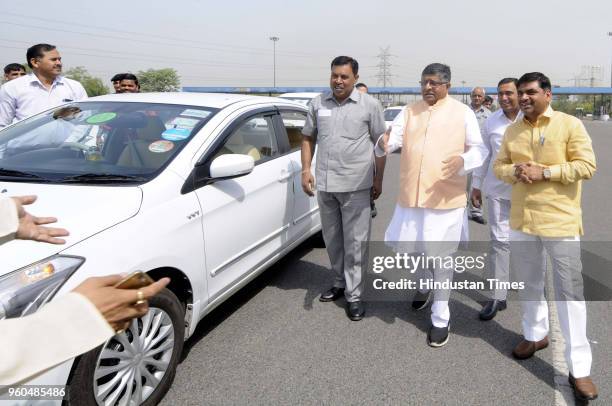 Union Minister Mahesh Sharma welcomes Union Law Minister Ravi Shankar Prasad at DND , on May 20, 2018 in Noida, India.