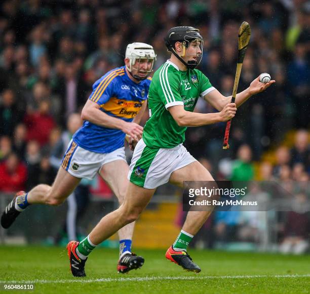 Limerick , Ireland - 20 May 2018; Barry Murphy of Limerick, races clear of Séamus Kennedy of Tipperary, as he prepares to score a late goal during...