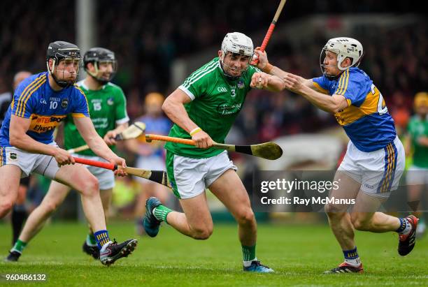 Limerick , Ireland - 20 May 2018; Aaron Gillane of Limerick in action against Dan McCormack, left, and Sean O'Brien of Tipperary during the Munster...