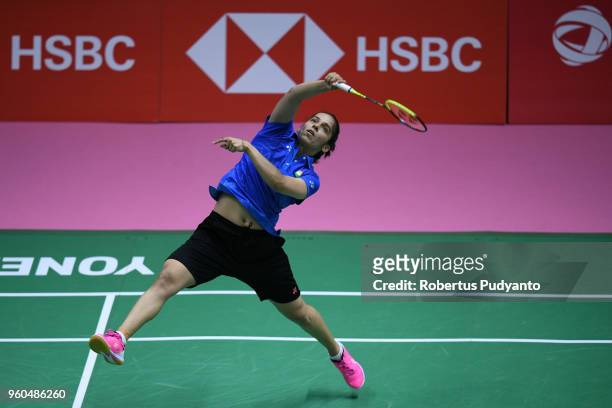 Saina Nehwal of India competes against Michelle Li of Canada during qualification match on day one of the BWF Thomas & Uber Cup at Impact Arena on...
