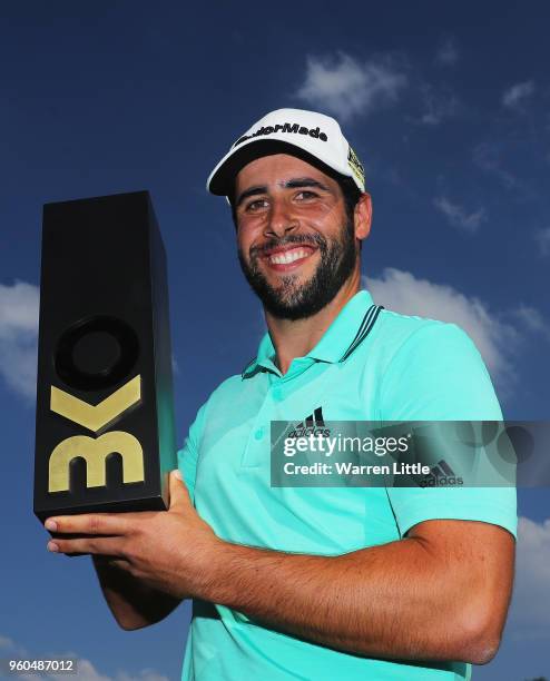 Adrian Otaegui of Spain poses with the trophy after beating Benjamin Hebert during their final match to win the tournament on the final day of the...