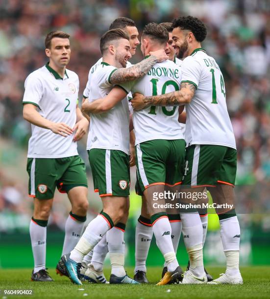 Glasgow , United Kingdom - 20 May 2018; Alan Browne is congratulated by his Republic of Ireland XI team-mate Sean Maguire, left, and Derrick...