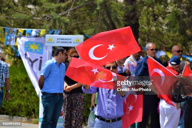 Supporter waves Turkish flags during a rally in support of Meral Aksener, presidential candidate and the leader of the opposition IYI Party, in...
