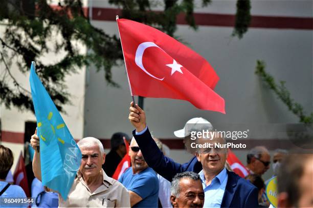 Supporter waves a Turkish flag during a rally in support of Meral Aksener, presidential candidate and the leader of the opposition IYI Party, in...
