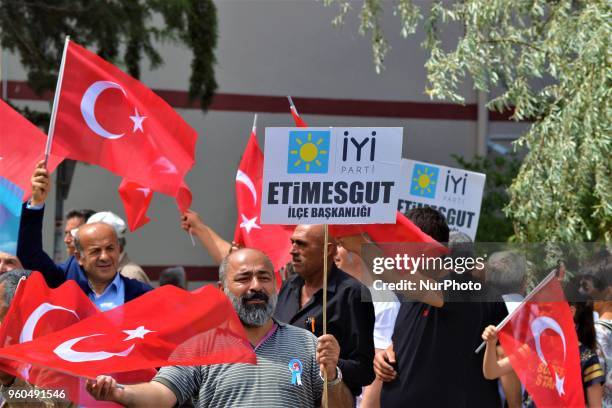 Member waves a Turkish flag during a rally in support of Meral Aksener, presidential candidate and the leader of the opposition IYI Party, in Ankara,...